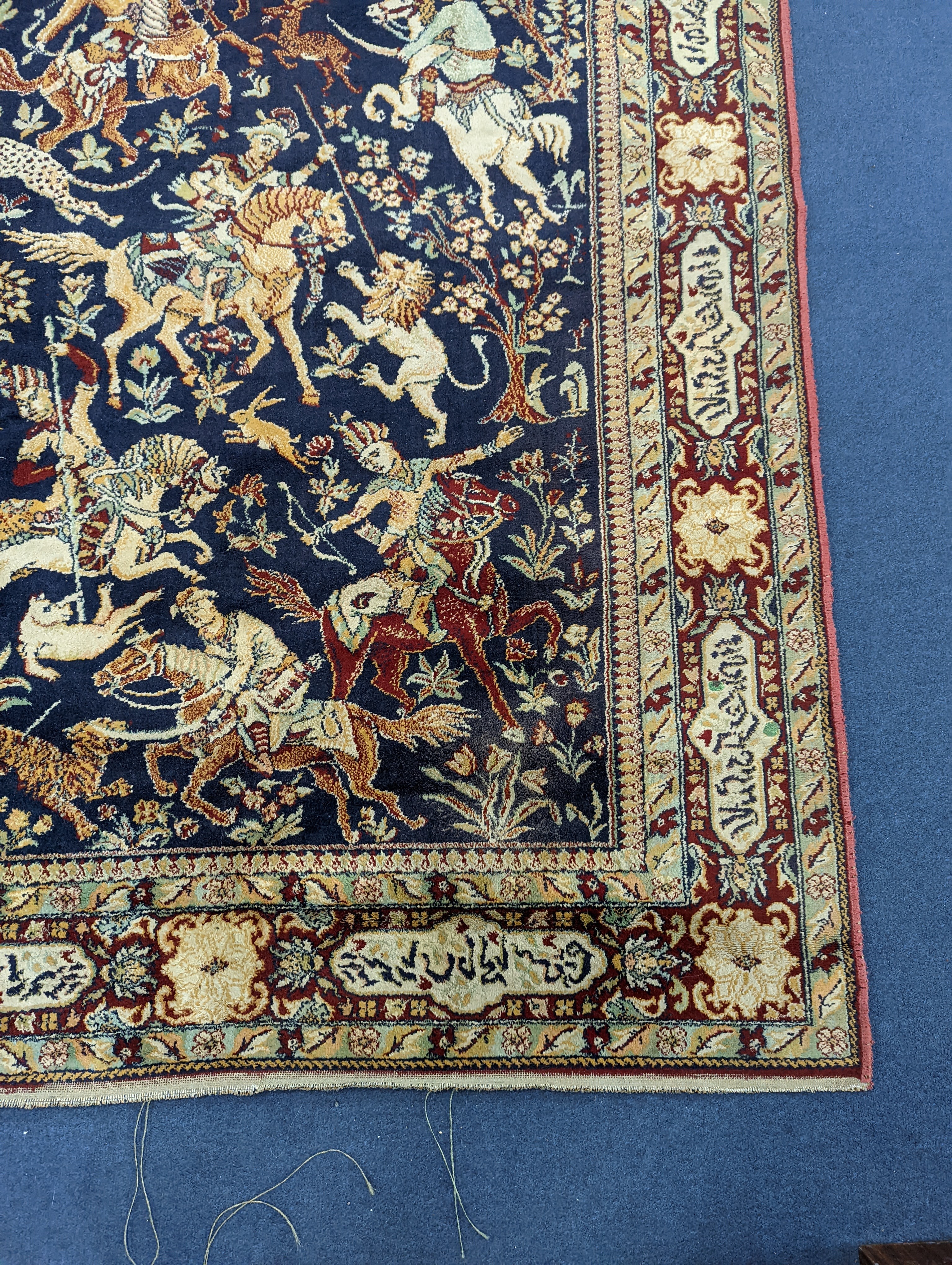 A Kashan style blue ground pictorial rug, 224 x 144cm